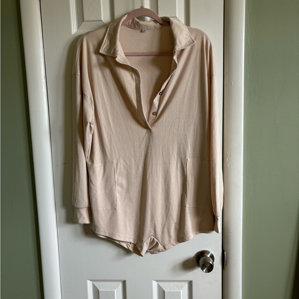 Beige one piece pajamas, size medium, runs big